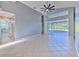 Bright living area with high ceilings and sliding glass doors at 3125 Bent Creek Dr, Valrico, FL 33596