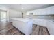 Bright, newly renovated kitchen with quartz countertops and ample counter space at 3562 Fisher Rd, Palm Harbor, FL 34683