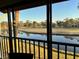Enjoy panoramic views from the screened balcony, overlooking the tranquil pond and green landscape at 4452 Weybridge St # 74, Sarasota, FL 34235