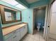 Bathroom with a spacious vanity area and a walk-in shower behind a door at 4452 Weybridge St # 74, Sarasota, FL 34235