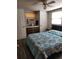 Bedroom with double bed, dresser and window at 519 51St Avenue W Ter, Bradenton, FL 34207