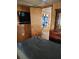 Bedroom with TV and dresser, access to another room at 519 51St Avenue W Ter, Bradenton, FL 34207
