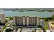 Aerial view of the building and waterfront at 7050 Sunset S Dr # 405, South Pasadena, FL 33707