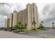 High rise building with parking and landscaping at 7050 Sunset S Dr # 405, South Pasadena, FL 33707