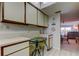 Kitchen breakfast nook with a small table and chairs at 7050 Sunset S Dr # 405, South Pasadena, FL 33707
