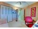Bright home office with built-in shelving and a work desk at 7050 Sunset S Dr # 405, South Pasadena, FL 33707