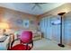 Spacious home office with a comfortable sofa and work desk at 7050 Sunset S Dr # 405, South Pasadena, FL 33707