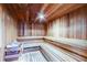 Relaxing wooden sauna with multiple benches at 7050 Sunset S Dr # 405, South Pasadena, FL 33707