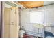 Small bathroom with shower, sink, and toilet at 715 40Th Ne Ave, St Petersburg, FL 33703