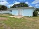View of the backyard with a patio and light blue exterior at 10170 64Th Ave, Seminole, FL 33772