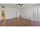 Large bedroom with tile floors, a ceiling fan and lots of natural light at 122 E Cypress Ct # 22, Oldsmar, FL 34677
