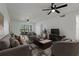 Comfortable living room featuring modern décor, cozy seating and lots of natural light at 122 E Cypress Ct # 22, Oldsmar, FL 34677