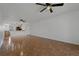 Expansive living space featuring tile floors, an open layout, and a kitchen area at 122 E Cypress Ct # 22, Oldsmar, FL 34677