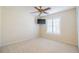 Bright bedroom with neutral walls and carpet at 1257 Corinth Greens Dr # 1257, Sun City Center, FL 33573