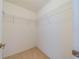 Spacious walk-in closet with wire shelving at 1257 Corinth Greens Dr # 1257, Sun City Center, FL 33573