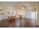 Spacious dining room with dark wood flooring and kitchen views at 1257 Corinth Greens Dr # 1257, Sun City Center, FL 33573