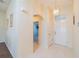 Bright and airy entryway with tile flooring and access to other rooms at 1257 Corinth Greens Dr # 1257, Sun City Center, FL 33573