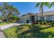 House exterior with garage and landscaping at 1257 Corinth Greens Dr # 1257, Sun City Center, FL 33573