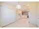 Kitchen features white cabinets and breakfast nook area at 1257 Corinth Greens Dr # 1257, Sun City Center, FL 33573