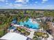 Community pool with plenty of lounge chairs at 1257 Corinth Greens Dr # 1257, Sun City Center, FL 33573