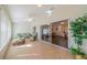 Bright sunroom with access to the backyard at 1257 Corinth Greens Dr # 1257, Sun City Center, FL 33573