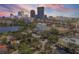 Stunning sunset aerial view of the property and its urban surroundings at 132 Mirror Lake N Dr # 404, St Petersburg, FL 33701