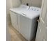 Convenient laundry room with a washer and dryer at 1651 Sand Key Estates Ct # 66, Clearwater Beach, FL 33767