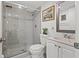 Clean bathroom with a walk-in shower and updated vanity at 19029 Us Highway 19 N # 13F, Clearwater, FL 33764