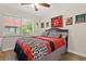 Guest bedroom with a queen-size bed and window at 19029 Us Highway 19 N # 13F, Clearwater, FL 33764