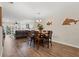 Bright dining area with hardwood floors and a view of the living room at 19029 Us Highway 19 N # 13F, Clearwater, FL 33764