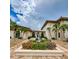 Elegant building exterior with manicured landscaping at 19029 Us Highway 19 N # 13F, Clearwater, FL 33764