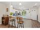 Kitchen with breakfast bar, granite counters, and wooden stools at 19029 Us Highway 19 N # 13F, Clearwater, FL 33764
