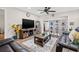 Spacious living room featuring comfortable seating and a large TV at 19029 Us Highway 19 N # 13F, Clearwater, FL 33764