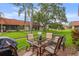 Relaxing patio with seating area and lush landscaping at 19029 Us Highway 19 N # 13F, Clearwater, FL 33764