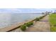 Concrete walkway offering scenic waterfront views at 19029 Us Highway 19 N # 13F, Clearwater, FL 33764