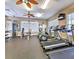 Well-equipped fitness center with treadmills and weight machines at 2035 River Turia Cir, Riverview, FL 33578