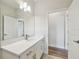 Bright bathroom with vanity featuring modern hardware and fixtures, next to a view of an open doorway at 2729 36Th N Ave, St Petersburg, FL 33713