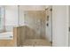 New bathroom features a walk-in glass shower and separate tub at 2729 36Th N Ave, St Petersburg, FL 33713