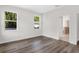 Spacious bedroom with hardwood floors and an ensuite bathroom at 2729 36Th N Ave, St Petersburg, FL 33713