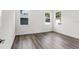 Bright bedroom with light-colored walls, hardwood floors, and large windows at 2729 36Th N Ave, St Petersburg, FL 33713