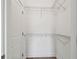 A walk-in closet with white walls, door, and wire shelving for storage at 2729 36Th N Ave, St Petersburg, FL 33713