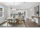 Open concept dining room next to kitchen with ample lighting and hardwood floors at 2729 36Th N Ave, St Petersburg, FL 33713
