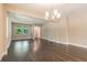 Dining room with hardwood floors and a chandelier at 2729 36Th N Ave, St Petersburg, FL 33713