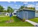 View of the detached structure with lush green grass, offering both functionality and aesthetic appeal at 2729 36Th N Ave, St Petersburg, FL 33713