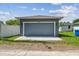 Detached garage in backyard and well-manicured lawn, offering both functionality and aesthetic appeal at 2729 36Th N Ave, St Petersburg, FL 33713
