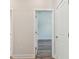 Hallway view leading to a bright room, showcasing modern finishes and ample natural light at 2729 36Th N Ave, St Petersburg, FL 33713