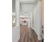 Bright hallway view leading to an open-concept living area and a modern kitchen at 2729 36Th N Ave, St Petersburg, FL 33713