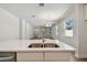 Bright, open kitchen with modern countertops and stainless steel appliances flows into the spacious living area at 2729 36Th N Ave, St Petersburg, FL 33713