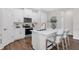 Modern kitchen features sleek white cabinets, stainless appliances, and a stylish breakfast bar at 2729 36Th N Ave, St Petersburg, FL 33713