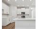 Bright kitchen with recessed lighting, white cabinets, stainless appliances, and center island at 2729 36Th N Ave, St Petersburg, FL 33713